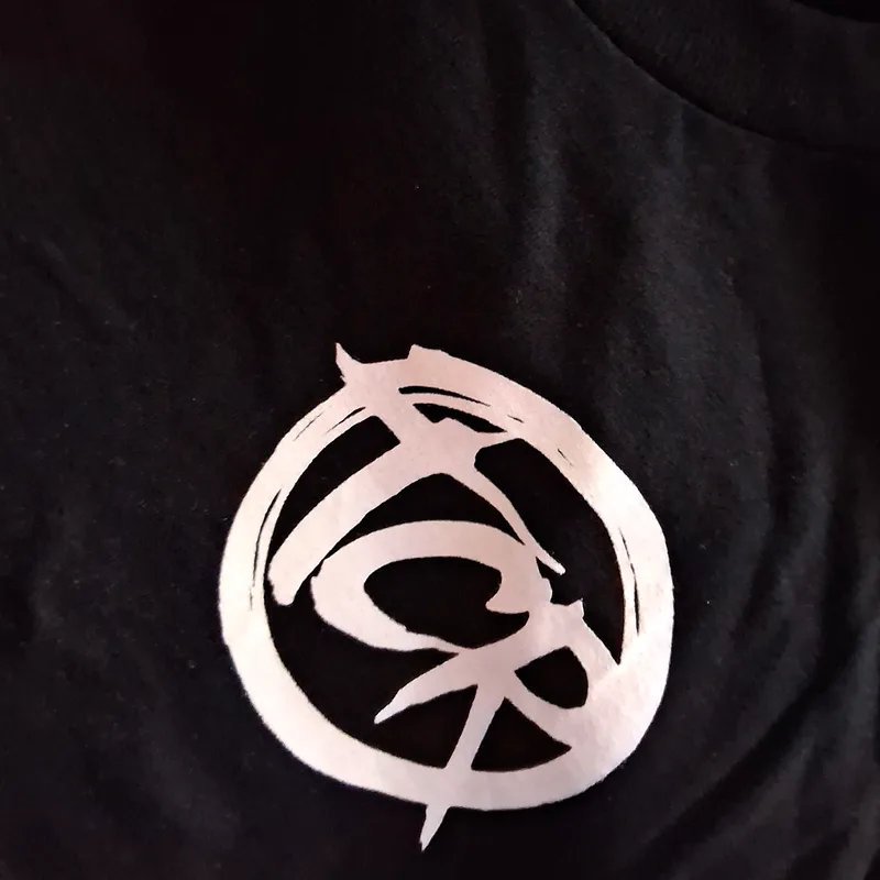 Black TCR t-shirt with the white seal chest print